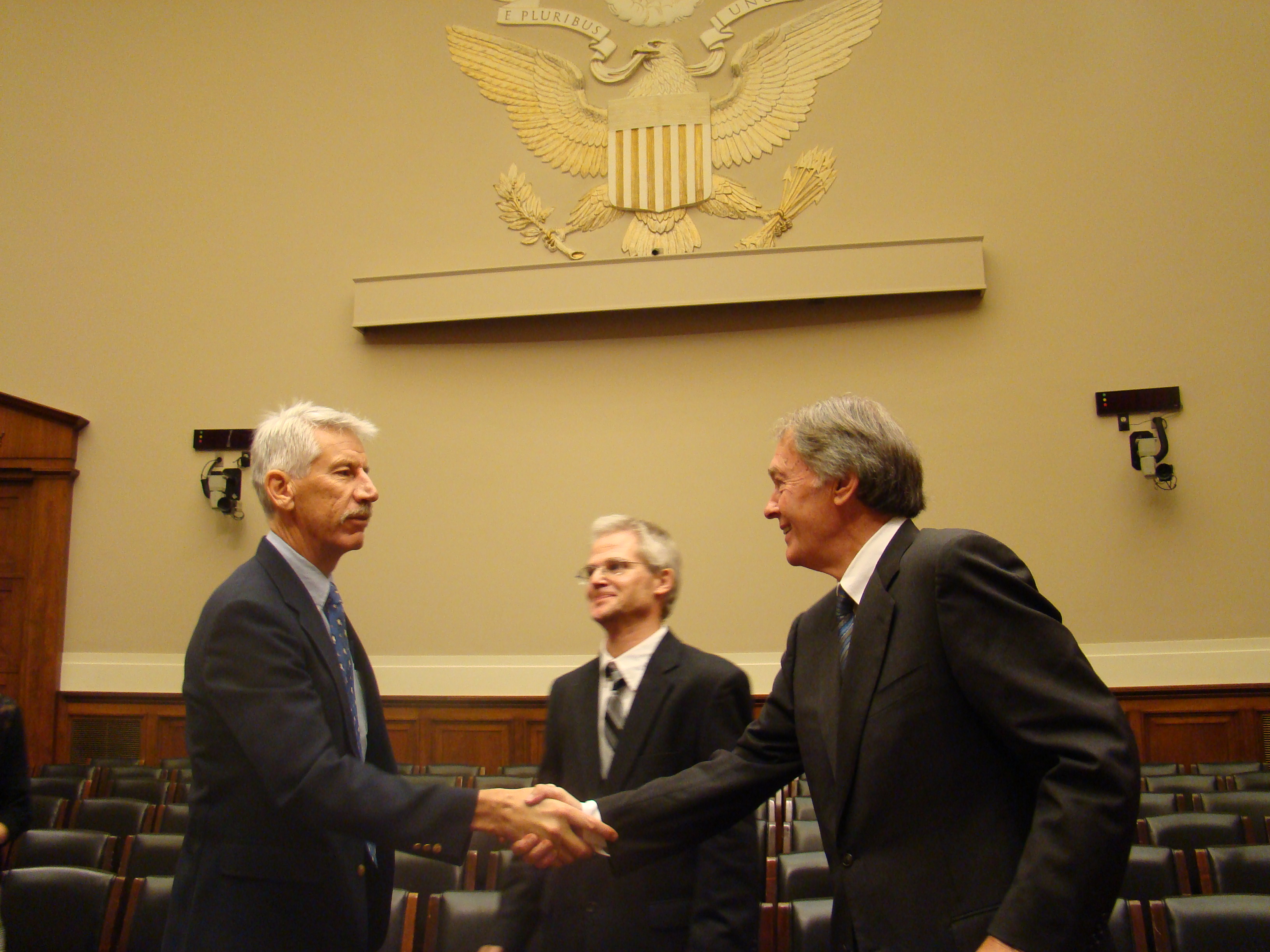 The witnesses speak with Chairman Markey